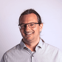 A portrait photo of Lee Savage